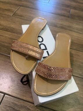 Aldo Women’s Rose gold/pink flat Sandals